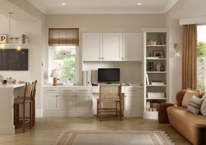 An office area in an open plan kitchen featuring light cabinetry using The Kitchen Depot's Nola shaker door in Taupe Grey.