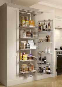 Pull out larder storage in a Taupe Grey kitchen with a Nola shaker door by The Kitchen Depot.